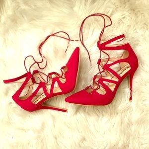 Lace-up red stilettos